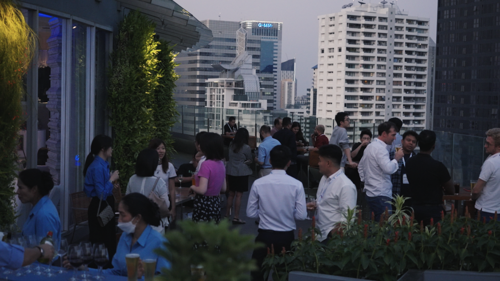 Attendees network and enjoy cocktails at the Altitude Rooftop & Bar after a day of informative sessions at Connects Bangkok.